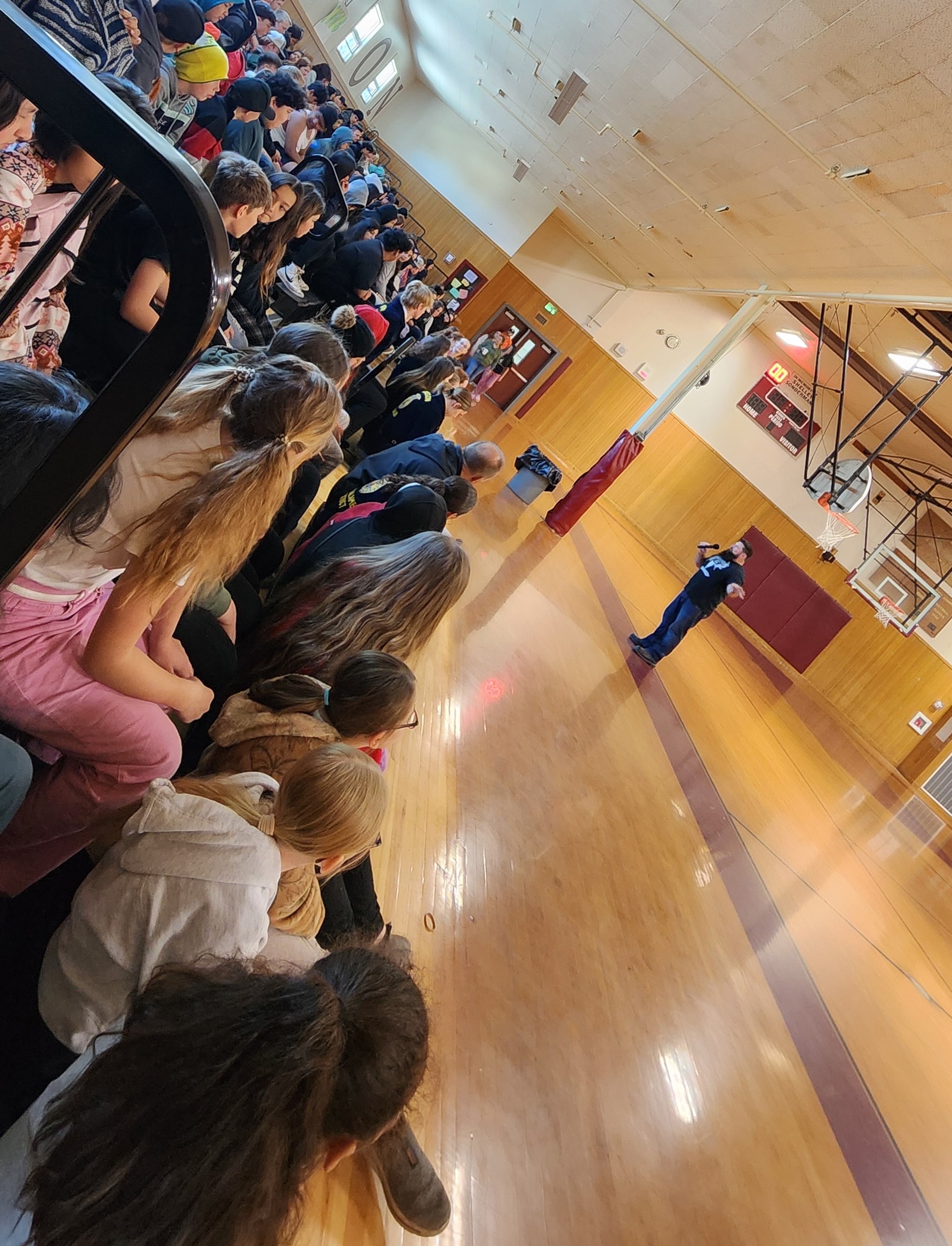 Rob Sharkey, agriculture influencer, speaks at a school event.