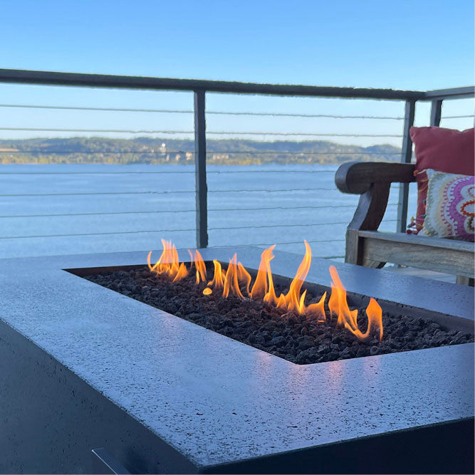 A patio fireplace running on propane