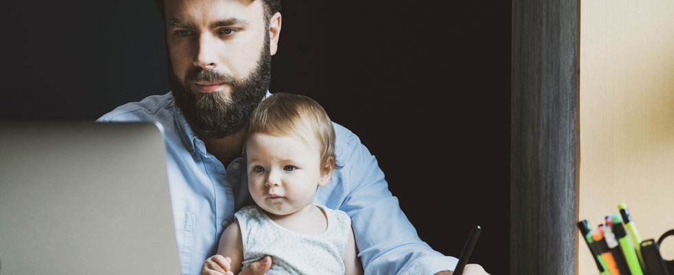 Father with Child at Work Desk