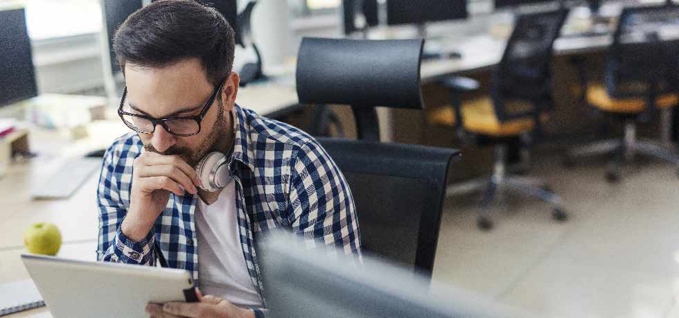 Employee at a desk working alone