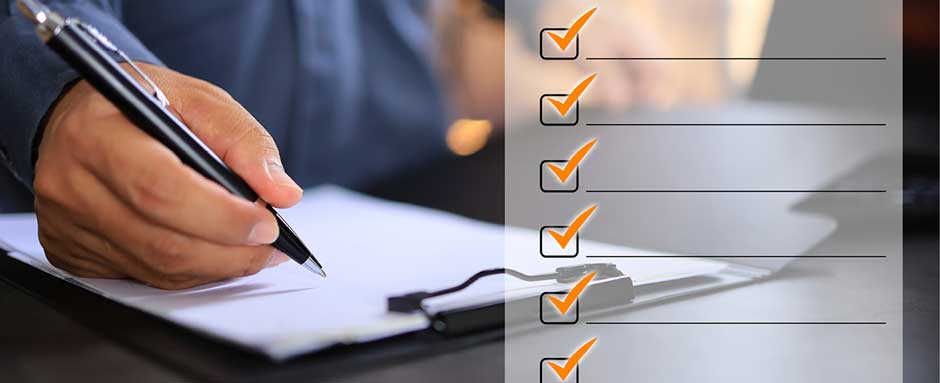 A man holds a pen over paper on a clipboard, with a graphic of a checklist overlaid