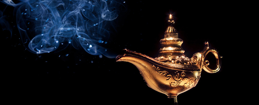 A golden genie lamp emits smoke and sparkles